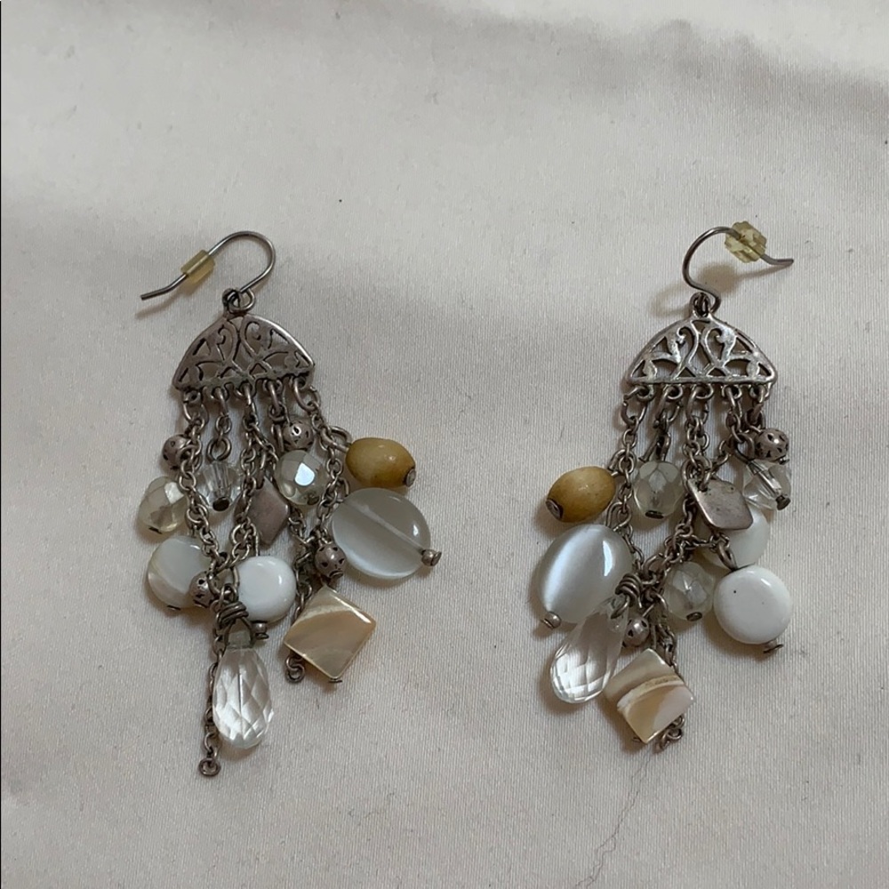 Silver and cream dangling earrings